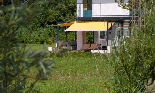 Huis Dijkstra vanuit de bosjes